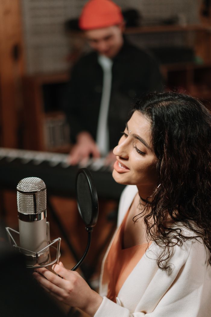 Podcaster at the microphone